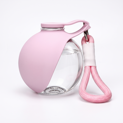 Botella de agua portátil para perros · Transparente · Rosa
